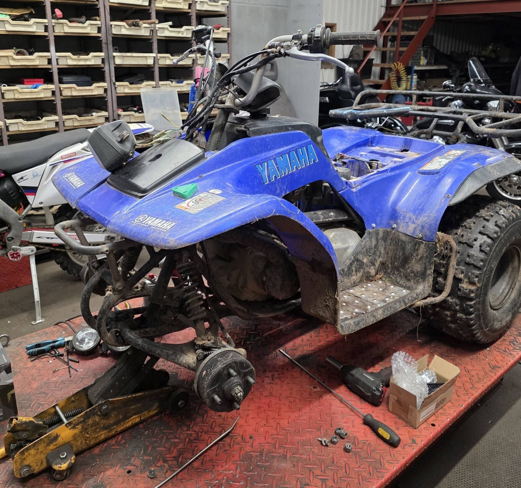Yamaha quad bike being repaired in the workshop